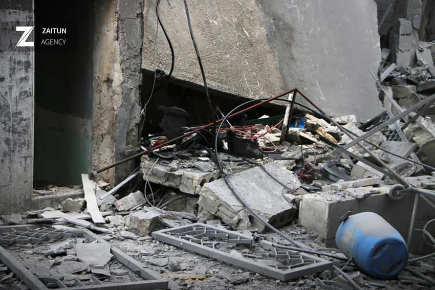 The damage to the entrance of Al Kinanah Hospital